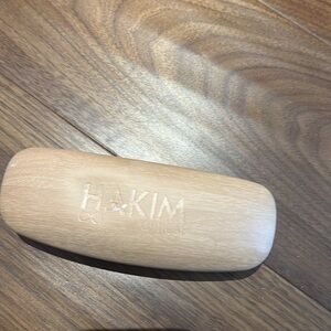 Set of four Glasses or sunglasses cases. Very nice. One Looks like wood.